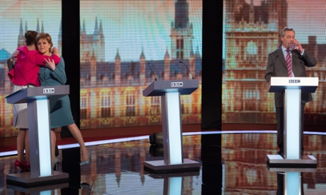 Plaid Cymru leader Leanne Wood, Green Party Leader Natalie Bennett and SNP leader Nicola Sturgeon share a hug UKIP leader Nigel Farage sips his drink after taking part in the Live BBC Election Debate 2015 