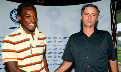 Michael Essien shakes hands with José Mourinho after joining Chelsea in 2005. They later worked together at Real Madrid.