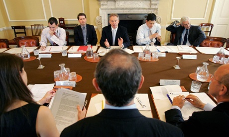 Justin Forsyth (second left) sits next to Tony Blair during his days working for the Labour prime minister in 2006.