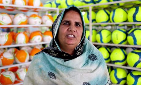 A football factory worker in Sialkot, Pakistan
