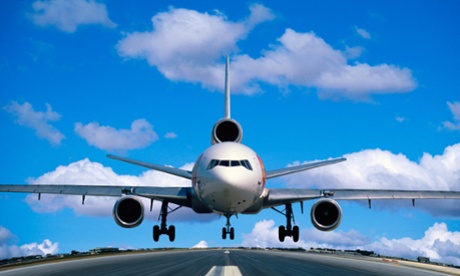 Plane taking off a runway.