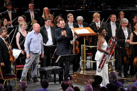 Composer John Woolrich with conductor Andris Nelsons and contra-bassoon soloist Margaret Cookhorn after the London premiere of Woolrich's Falling Down with the City of Birmingham Symphony Orchestra at the Royal Albert Hall.