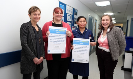 Nicci Gerrard, left, and Julia Jones, right, who are campaigning to get recognition for carers of dementia patients in hospitals, with Jo James (lead nurse for dementia medicine for elderly) and Josephine Tapit (ward manager) at St Mary's Hospital in Paddington, London.