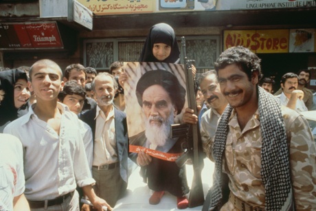 People show their support for Ayatollah Khomeini in the streets of Tehran in 1979.