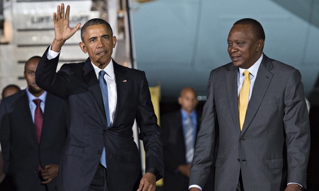 US President Barack Obama (L) waves alon