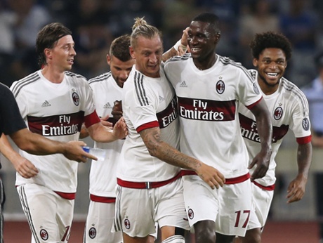 Philippe Mexes, centre, celebrates with team-mate Cristian Eduardo Zapata Valencia, second right, after his fabulous scissor kick.