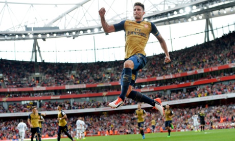 Arsenal's Olivier Giroud celebrates scoring the first goal in their 6-0 rout of Lyon.