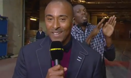 Usain Bolt videobombs the BBC's Colin Jackson