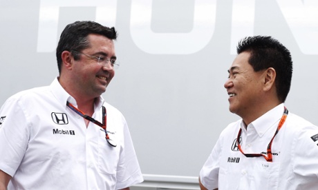 Eric Boullier, McLaren's racing director, shares his relief at his team's improved performance with Yasuhisa Arai, head of motorsport at Honda.