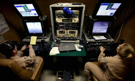 Members of the US military in Kandahar, southern Afghanistan, control a Predator drone.