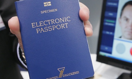 A host shows off a sample of the new German electronic passport that contains a computer chip to store biometric data. The Hamburg DPA has ruled that Facebook cannot request official documents to enforce its real name policy.
