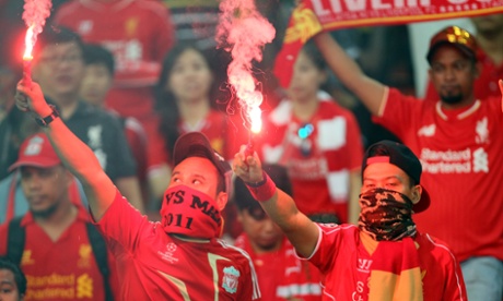 Liverpool fans in Malaysia, earlier.
