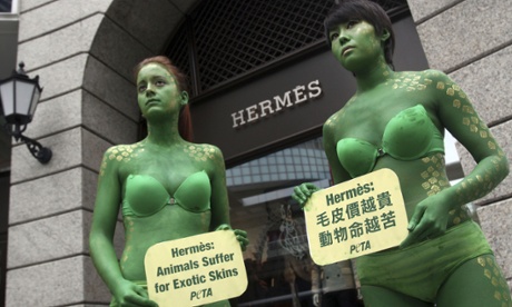 Peta activists protest outside a Hermès store in Taiwan.