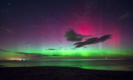 A view of the northern lights as seen from Bamburgh Castle Beach Northumberland, England. As stunning as the light show is on Earth, the one observed in the Lyra constellation is a million times brighter.