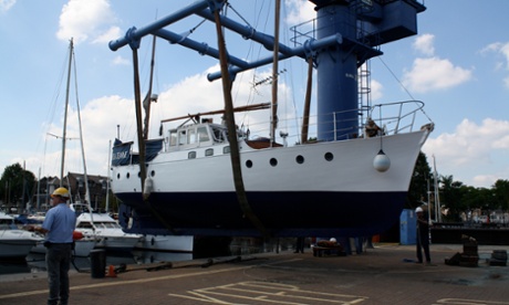 Pamela Jeanne is lowered back into the water after maintenance.