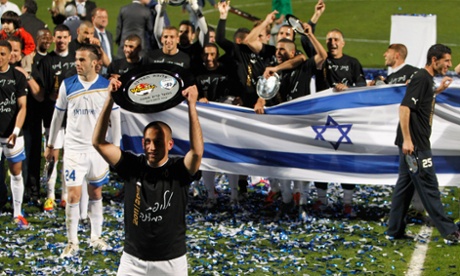 Hapoel Ironi Kiryat Shmona celebrate after winning the Israeli title in 2012.