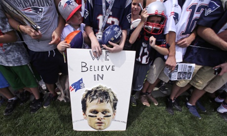 Fans gathered at New England Patriots training camp show their support for quarterback Tom Brady.