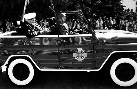 Sevastopol, Crimea, 2013: An officer drives past crowds during a parade to commemorate Russian victory in the second world war.