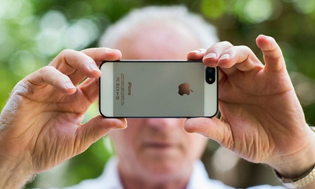 man looking at mobile