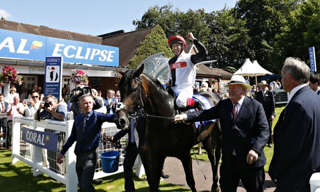 Frankie Dettori celebrating as Golden Horn returns after winning the Eclipse Stakes at Sandown