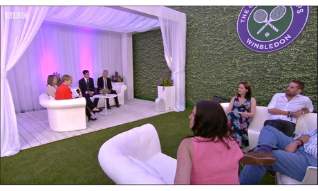 Clare Balding, in red, hosting the BBC's revamped highlights progamme from a new set in Wimbledon