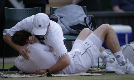 Andy Murray receives treatment to his shoulder during a medical timeout.