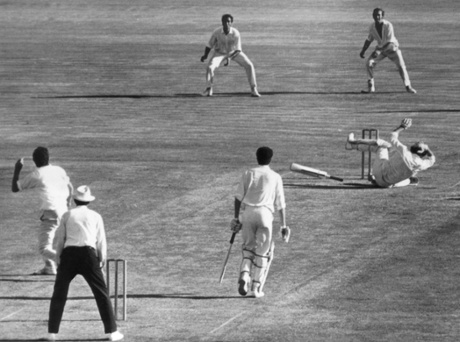 Australian cricketer Terry Jenner is struck on the head by a ball from John Snow during the Sydney Test in 1971.