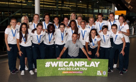 The England team pose at Heathrow after returning from the Women's World Cup