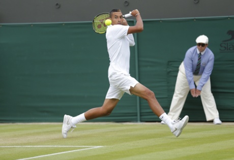 Nick Kyrgios returns