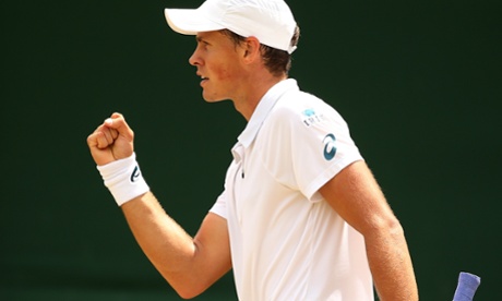 Vasek Pospisil celebrates a point and takes control of the fifth set against Viktor Troicki.