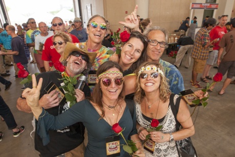 Fans at the opening night of the Grateful Dead with their free red roses.