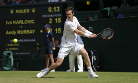 Andy Murray measure a return against Karlovic.
