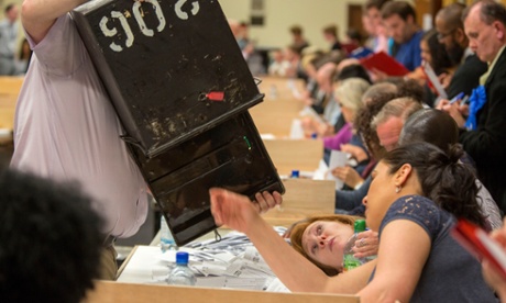 emptying a ballot box.