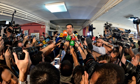 Greek prime minister Alexis Tsipras speaks to journalists.