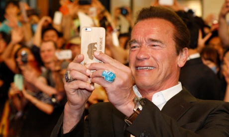 A big ring, but not from the tills … Arnold Schwarzenegger takes a selfie during Terminator Genisys' South Korea premiere.