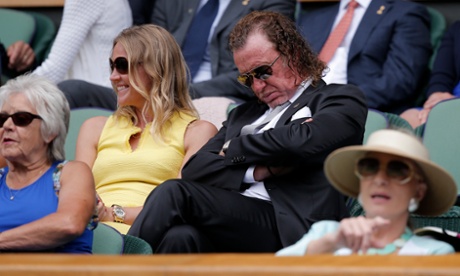 The golfer Miguel Angel Jimenez snoozes on Wimbledon's Centre Court.
