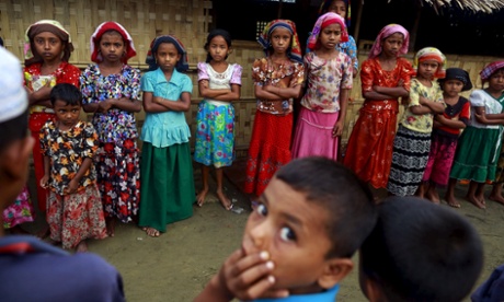 Rohingya children attend a class at a refugee camp outside Sittwe, Burma, in May … a report by the Minority Rights Groups says that minority and indigenous communities are being displaced into cities at an alarming rate.