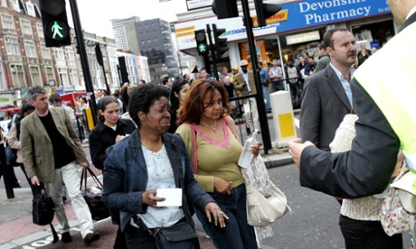 Evacuated tube passengers fill the street at Edgware Road following the explosion