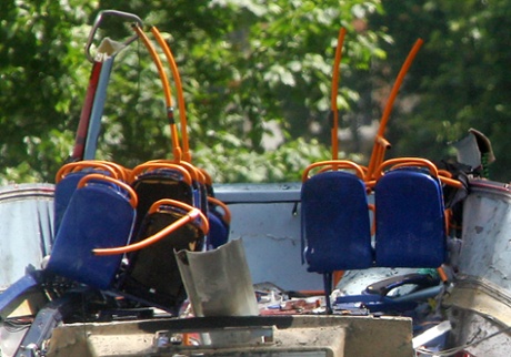 The wreckage of a bus is seen near Russell Square 