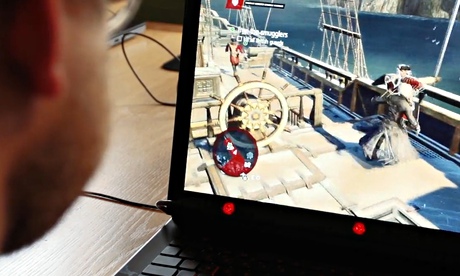 A video game players uses the SteelSeries Sentry Gaming Eye Tracker.