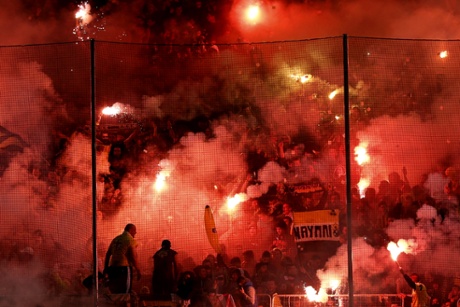 AEK fans at the start of a match with Olympiakos.