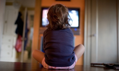 Young girl watching television