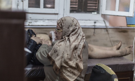 A doctor performs ultrasound on a girl at the Hope Village centre