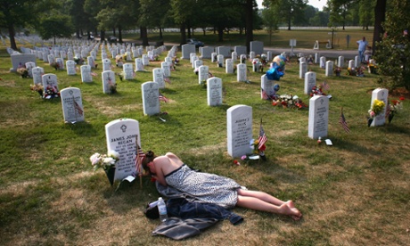 Mary McHugh mourns her dead fiance James Regan at Section 60 in the Arlington National Cemetery on 27 May 2007. 