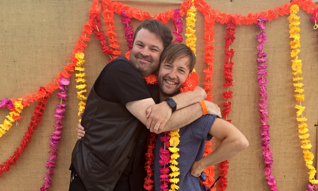 Glenn Wool with his arms wrapped round the shorter Andrew Maxwell