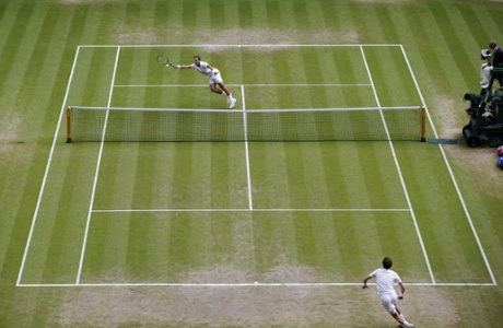 Vasek Pospisil, top, returns to Andy Murray.