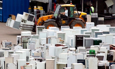 Old refrigerators being cleansed of the offending CFC gases before disposal, in Lewes, East Sussex