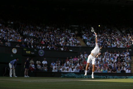 Djokovic serves.