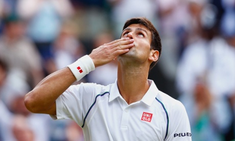 Novak Djokovic celebrates after winning his quarter final match against Marin Cilic.