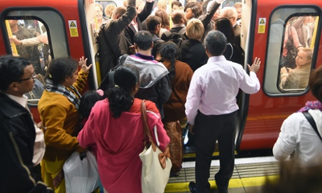 Passengers squeeze aboard on Wednesday evening.